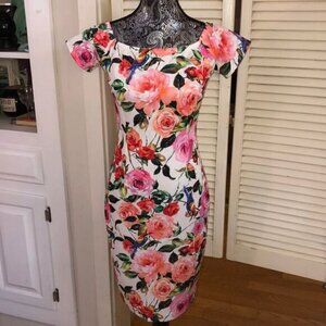 Stunning Floral Paradise Bodycon Midi Dress by Alexia Admore. All eyes on you!